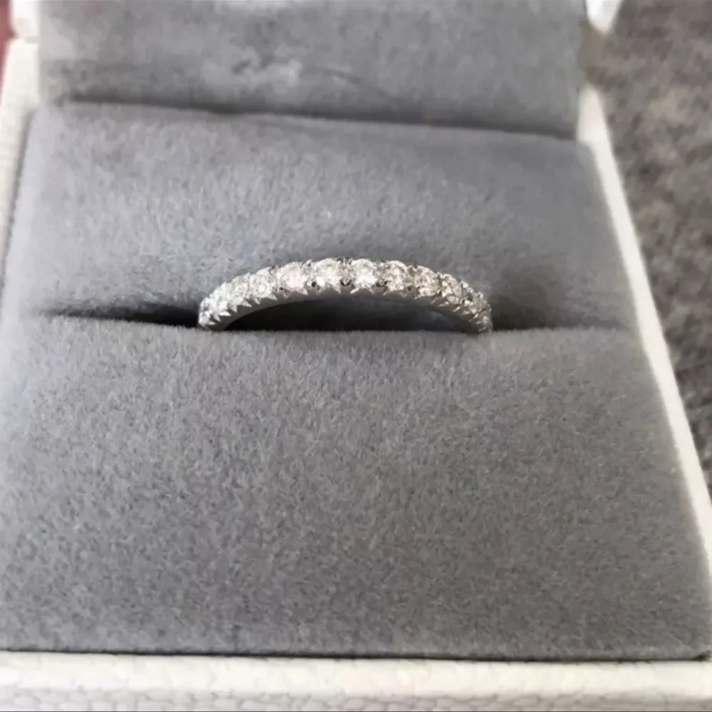Round brilliant eternity wedding band